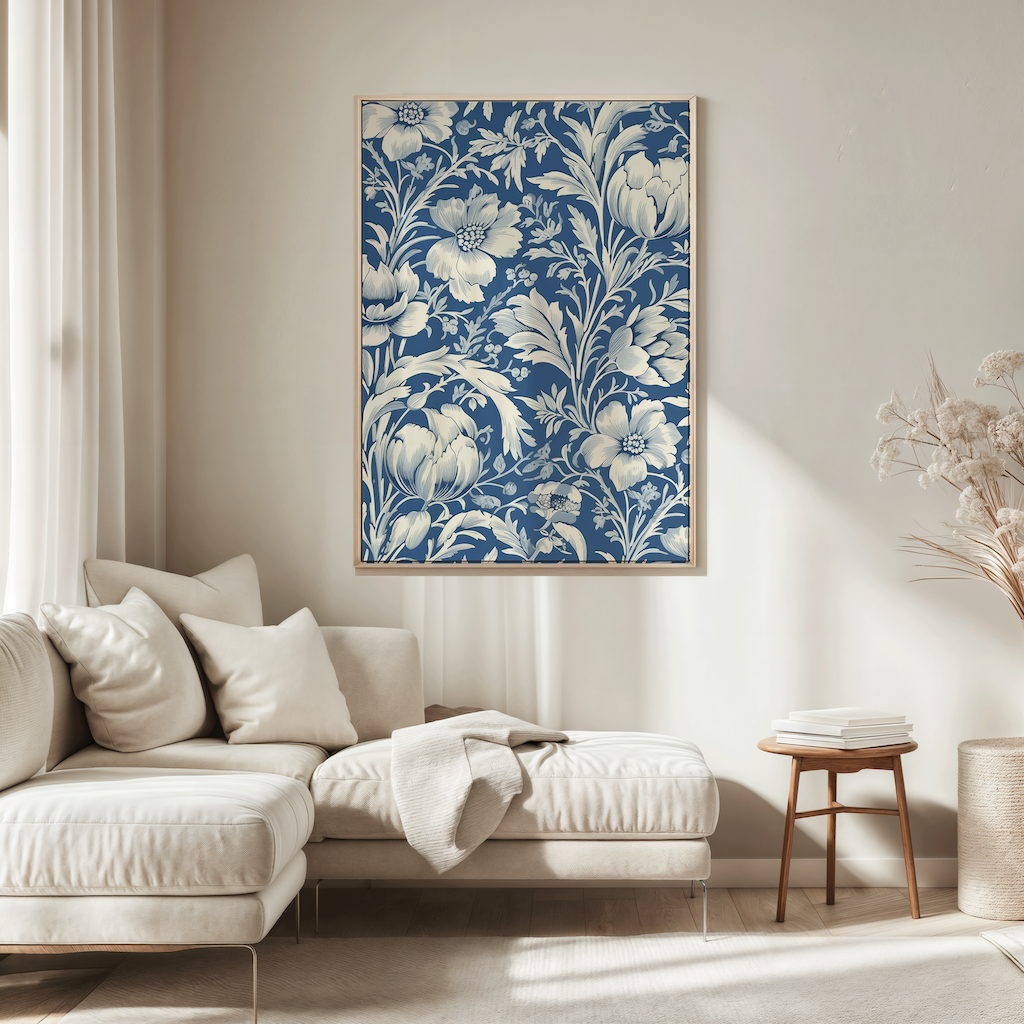 Blue and white floral patterned wall art above a beige sofa in a bright living room.