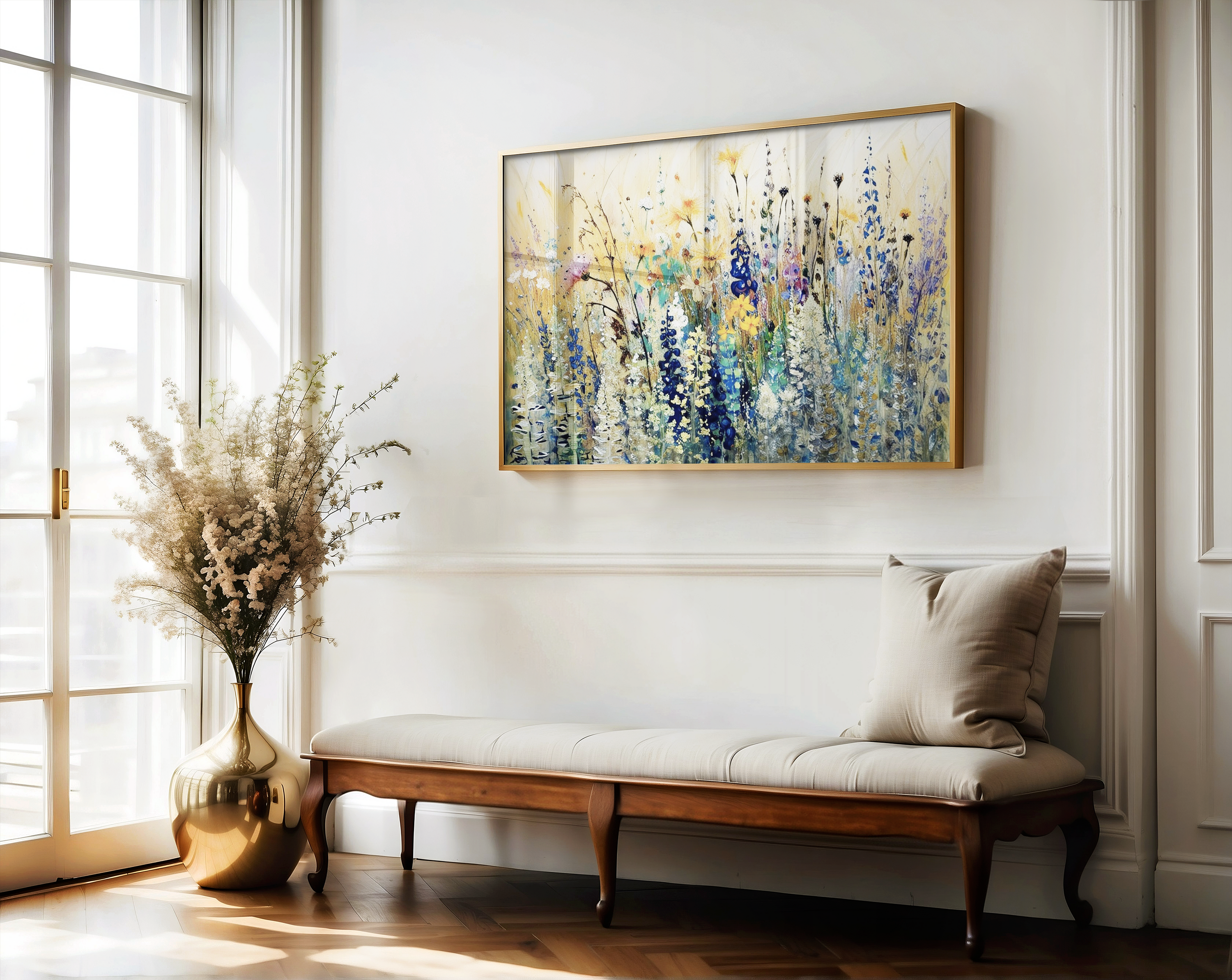Colorful wildflower floral wall art framed above hallway bench with bright natural light and a vase with dried flowers