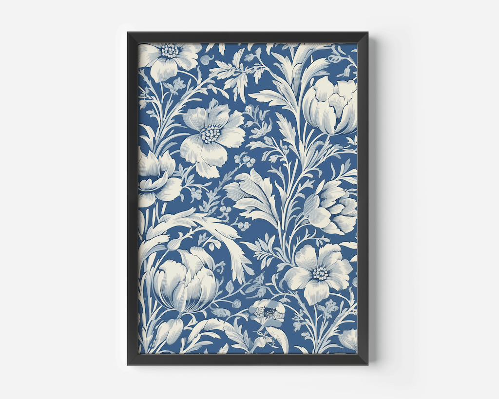 Detailed close-up of blue and white floral artwork in a black frame