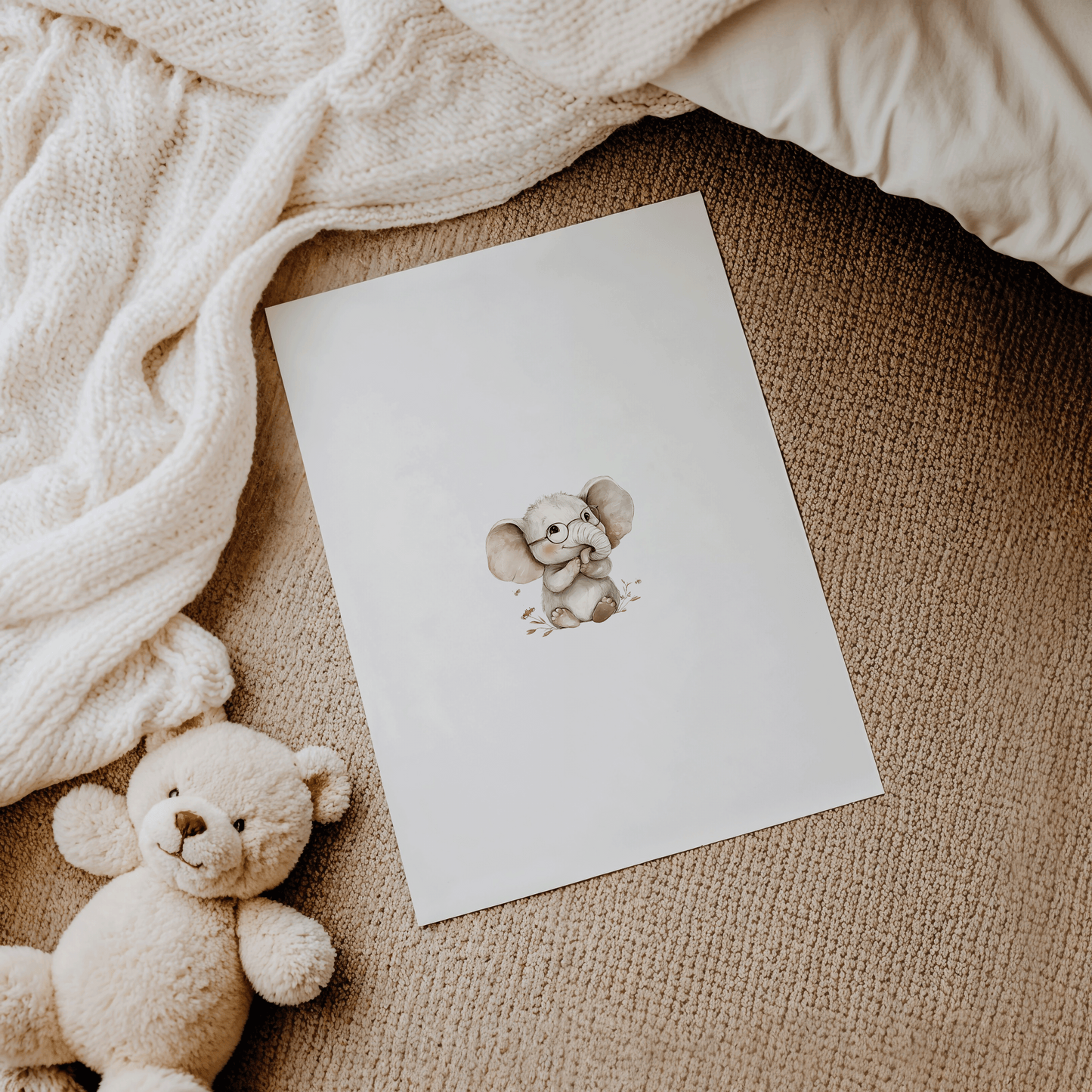 Unframed fine art paper print of baby elephant with glasses, resting on floor in nursery