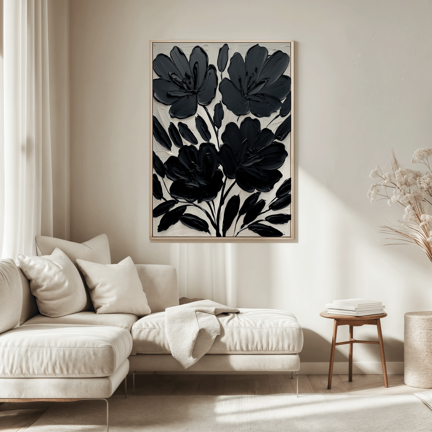 Black floral wall art abstract flower print framed and styled above a beige sofa in a modern neutral living room décor