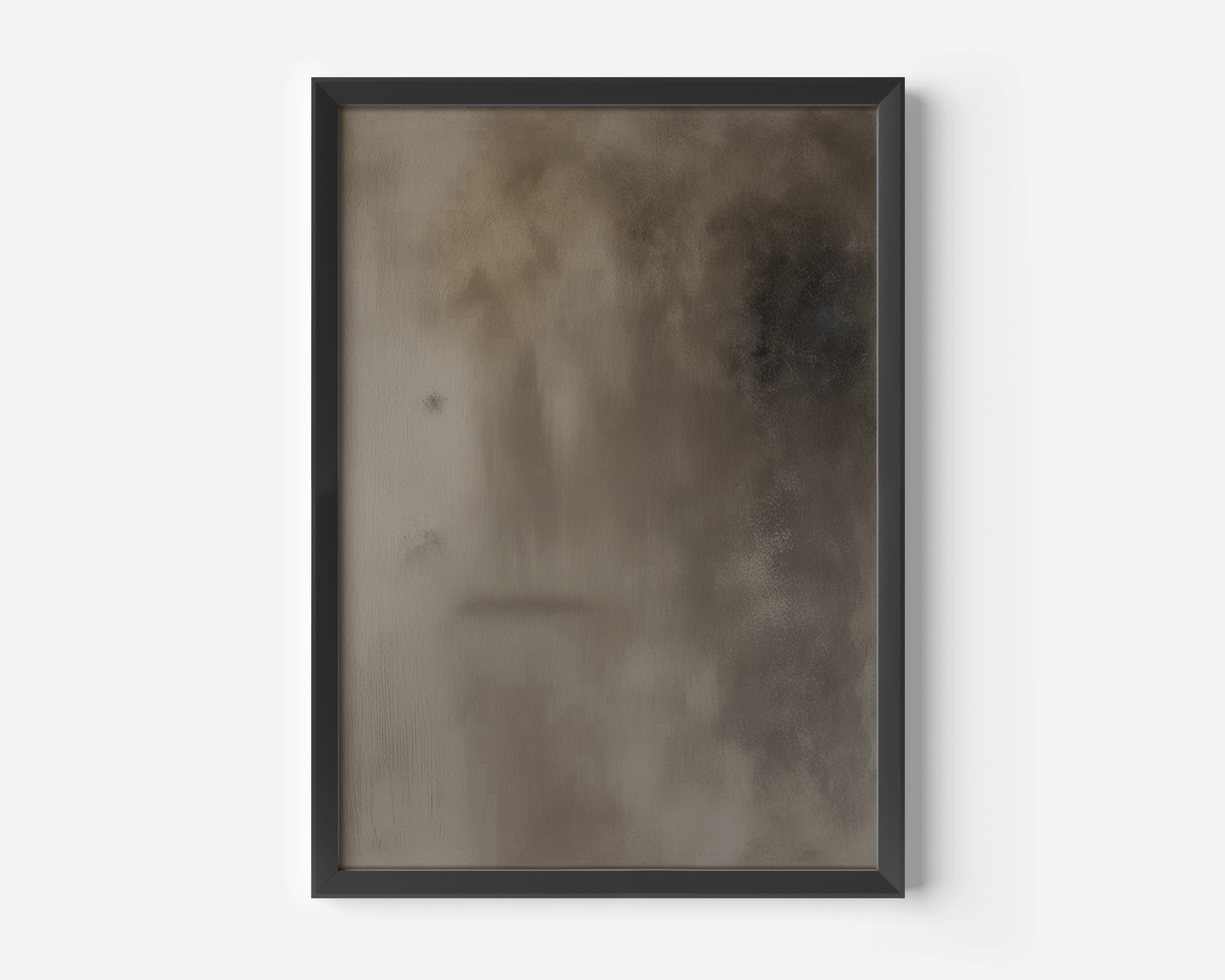 Close-up of moody earthy abstract wall art in black modern frame against a white wall