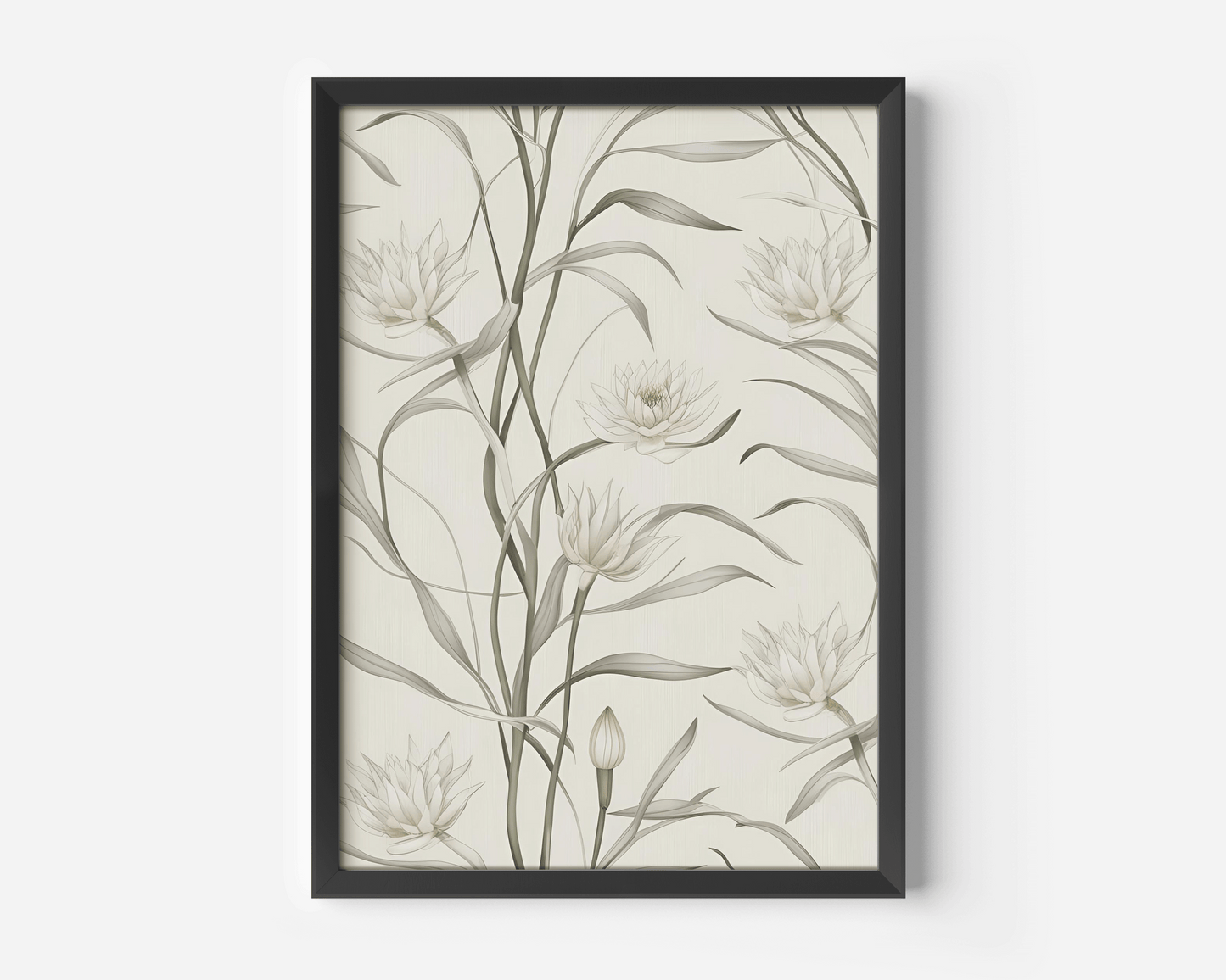 Close-up of black-framed canvas wall art with white lotus flowers and muted sage leaves in an abstract design