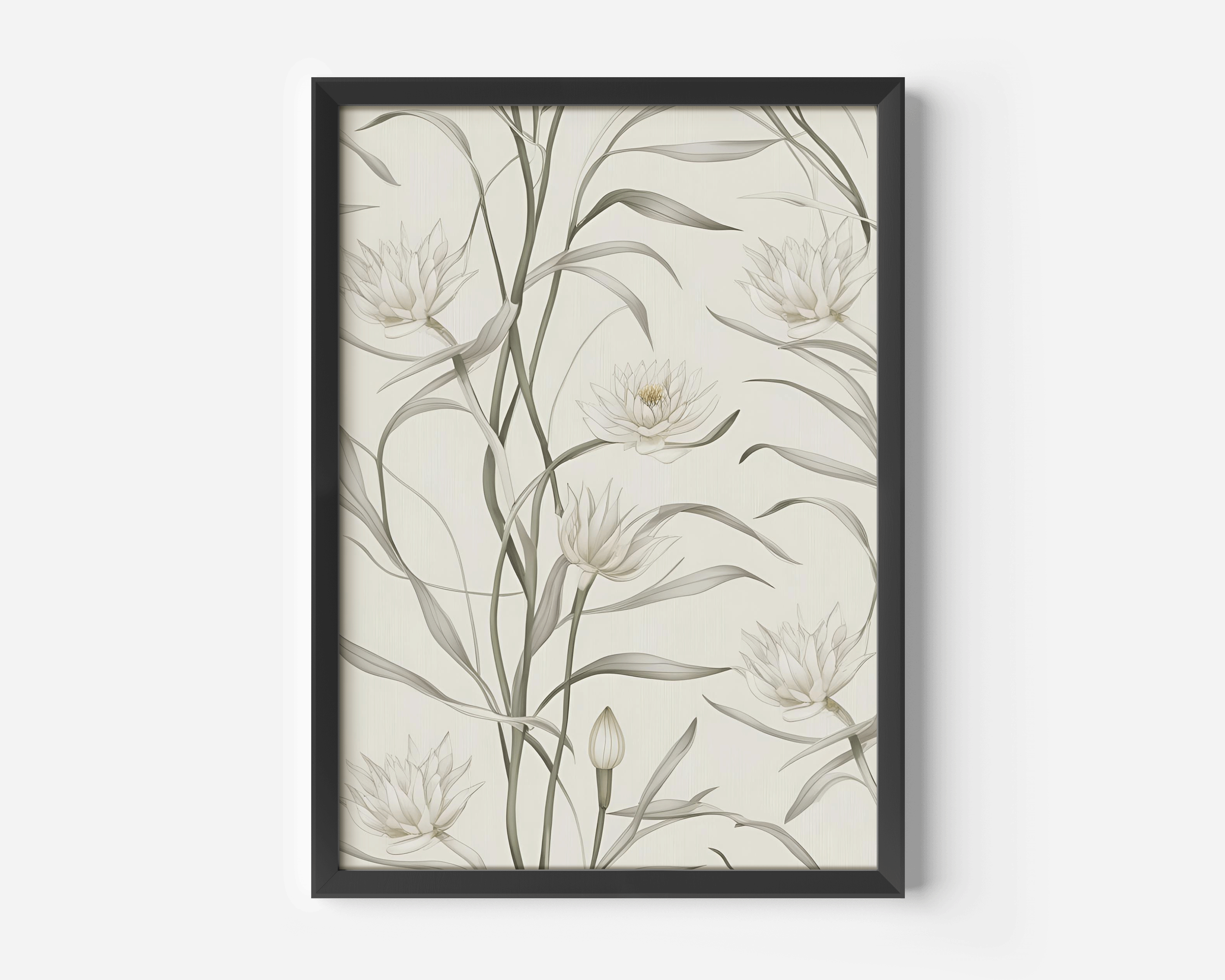 Close-up of black-framed canvas wall art with white lotus flowers and muted sage leaves in an abstract design