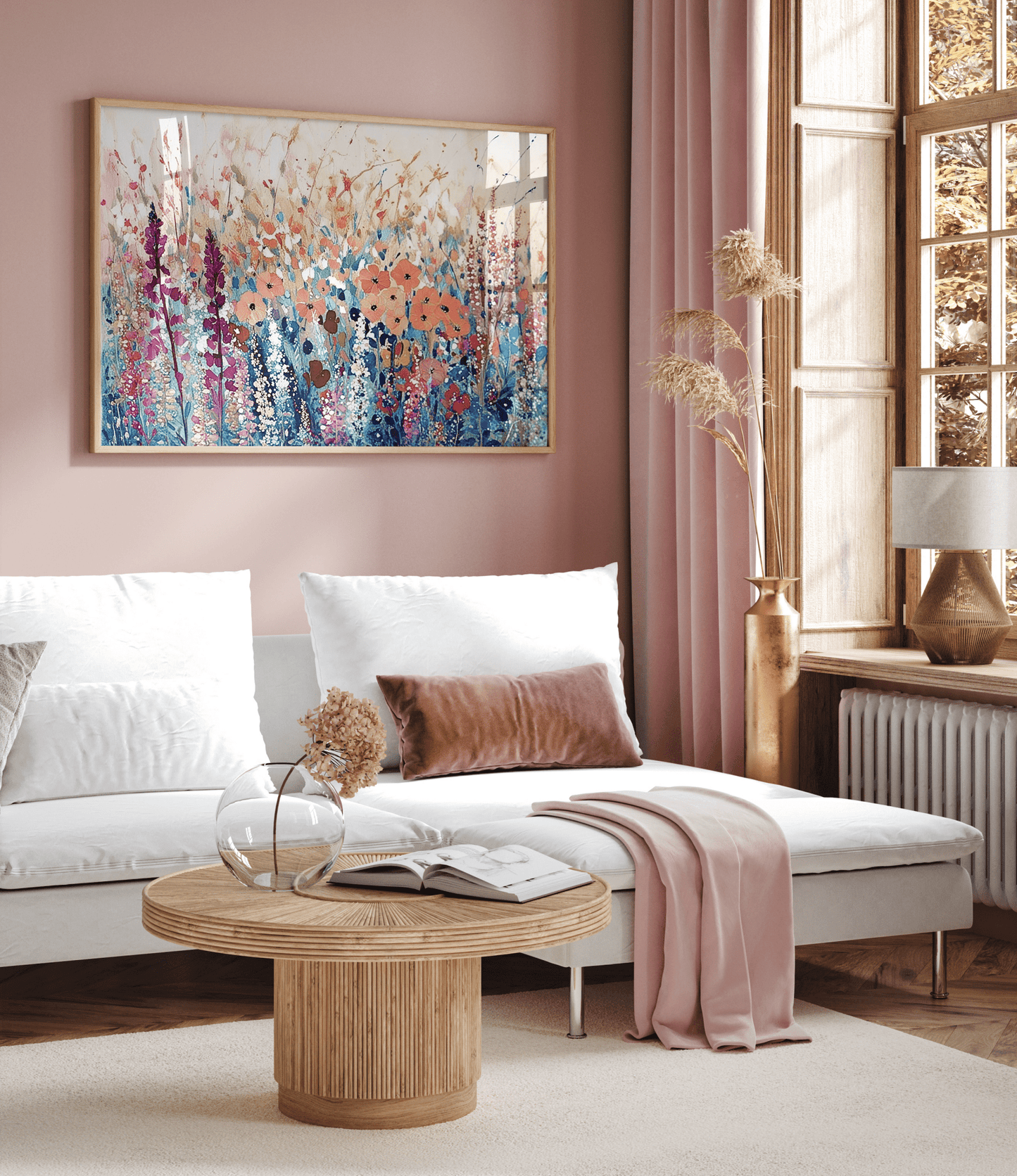 Impressionist abstract wildflower wall art framed above a white sectional sofa and styled in a modern living room with blush pink walls, curtain and wooden accents