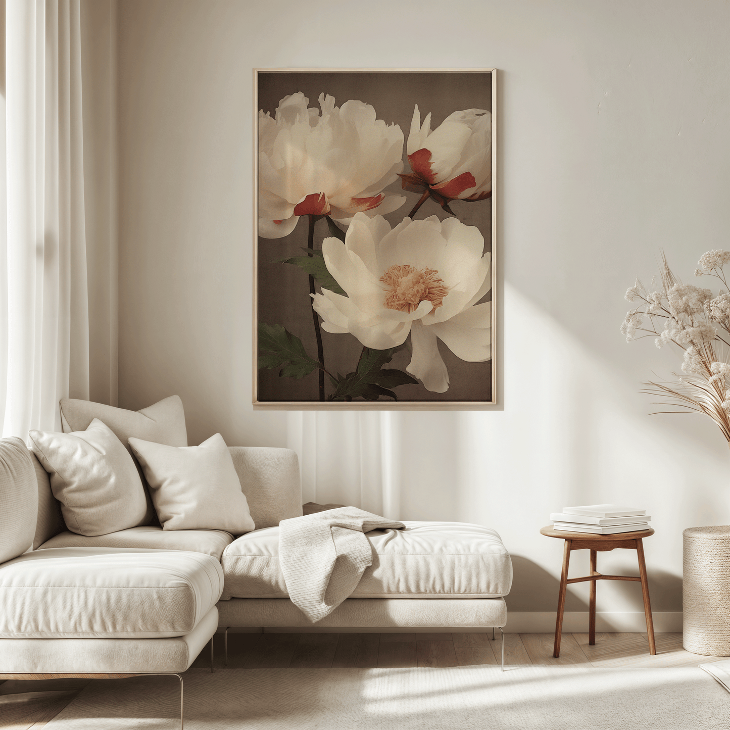 Large framed lotus flower wall art above cream sectional sofa in a neutral, minimal living room