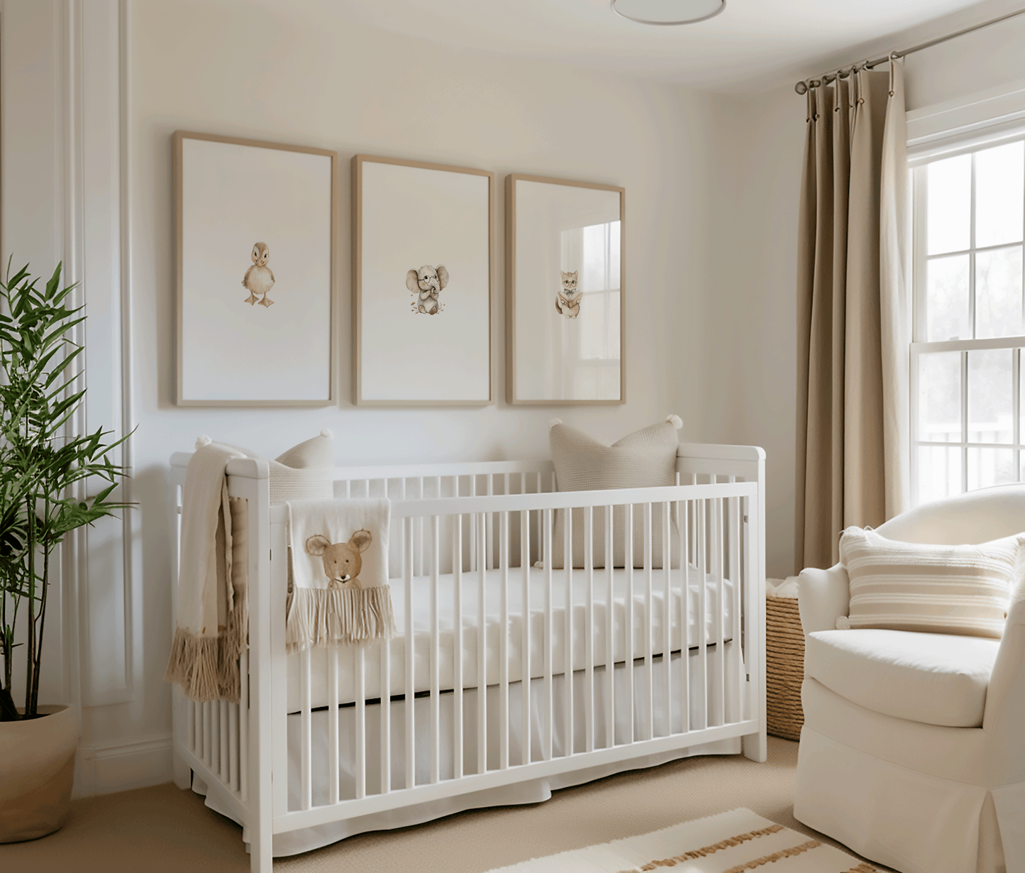 Neutral nursery with a set of 3 baby animal art prints in modern wooden frames for a woodland nursery, baby duck, baby elephant and baby cat wall art