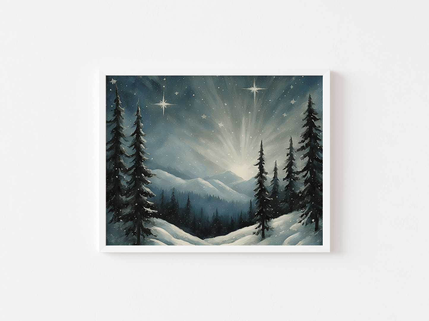 Framed starry winter night Christmas wall art print with snowy mountain landscape, pine trees, and glowing stars, shown in a white frame on a neutral background.