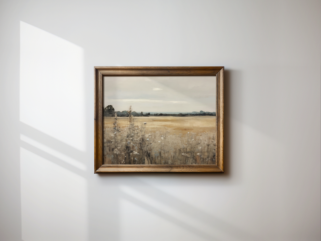 Vintage landscape wall art with golden fields and cloudy sky, framed in rustic wood. Neutral countryside wall decor for farmhouse or modern living rooms.