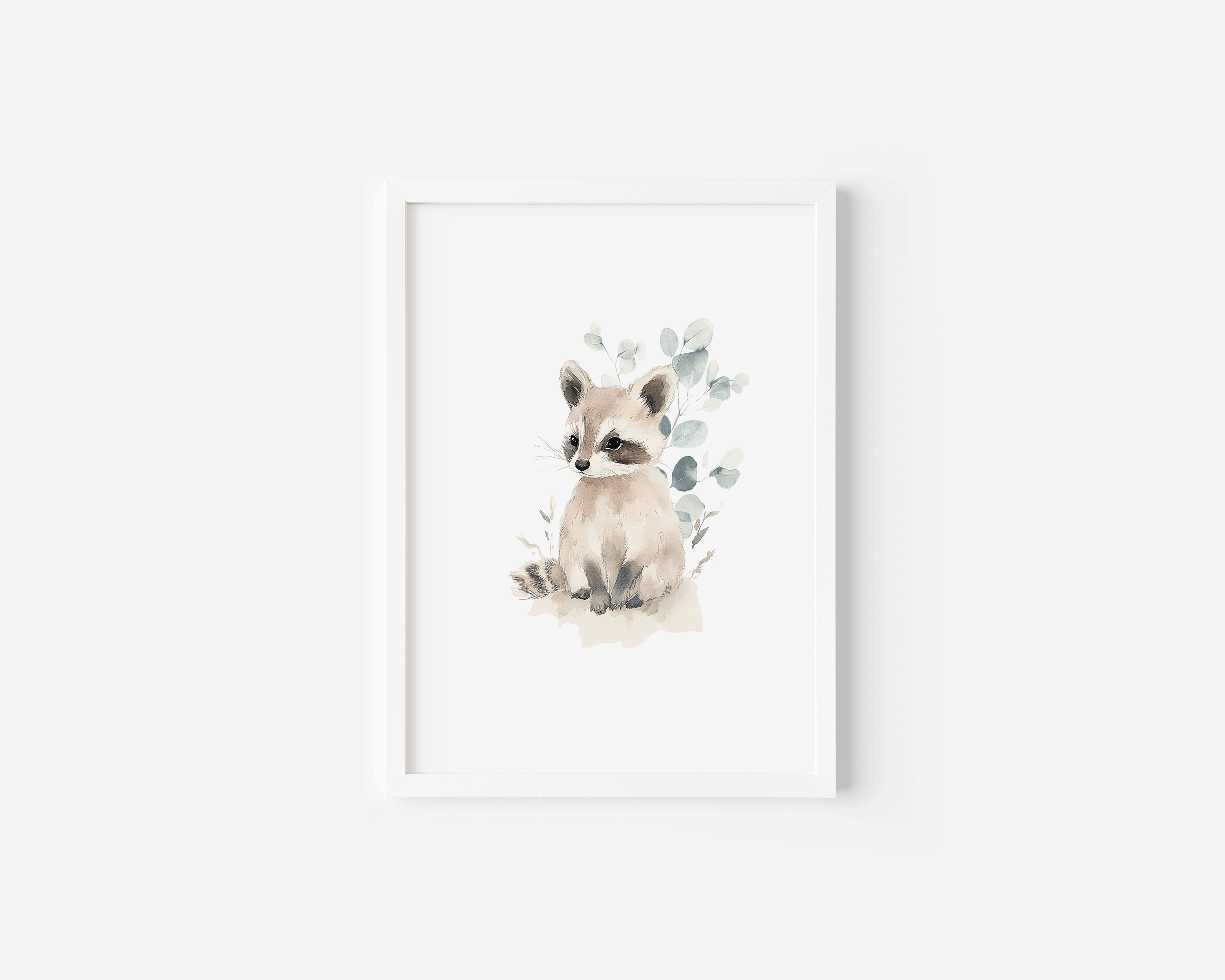 Watercolor raccoon nursery wall art print with eucalyptus foliage in a white wood frame