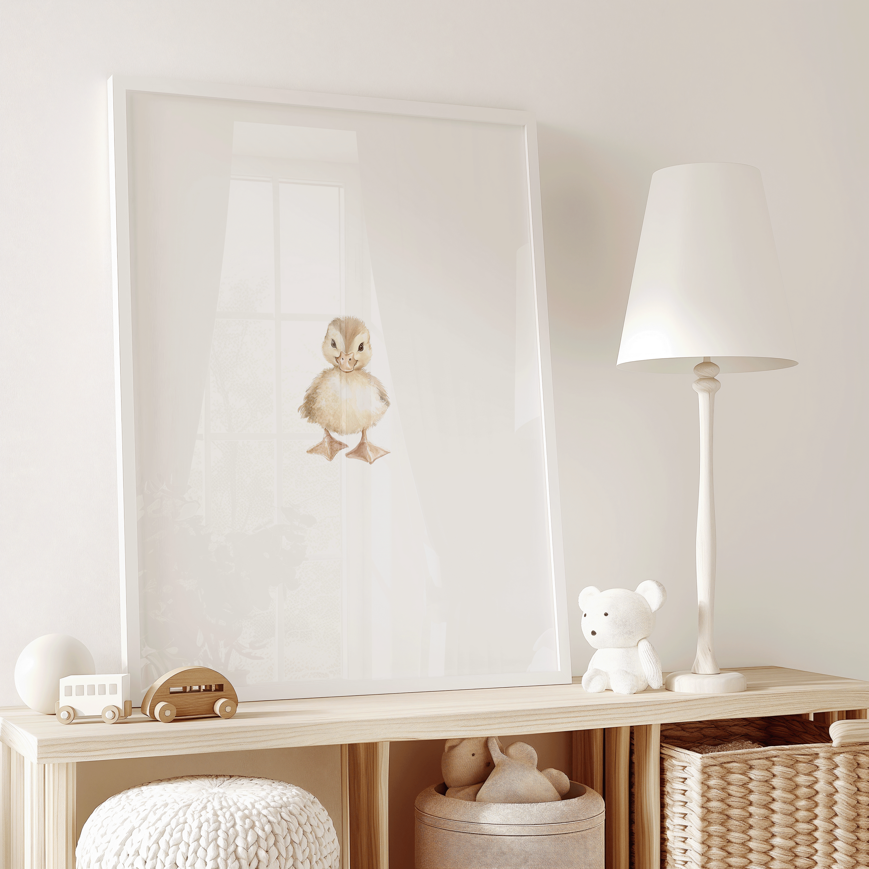 Soft neutral kids play room featuring woodland baby wall art of a vintage baby duck, beige white wall tones