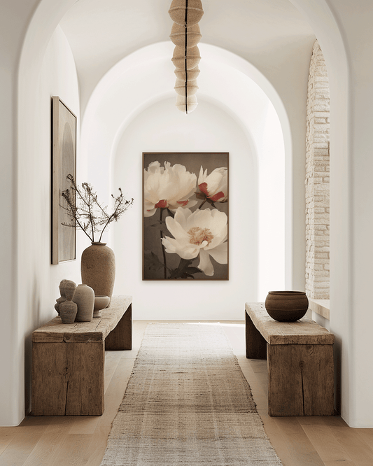 Large white lotus floral wall art framed in a rustic modern arched hallway