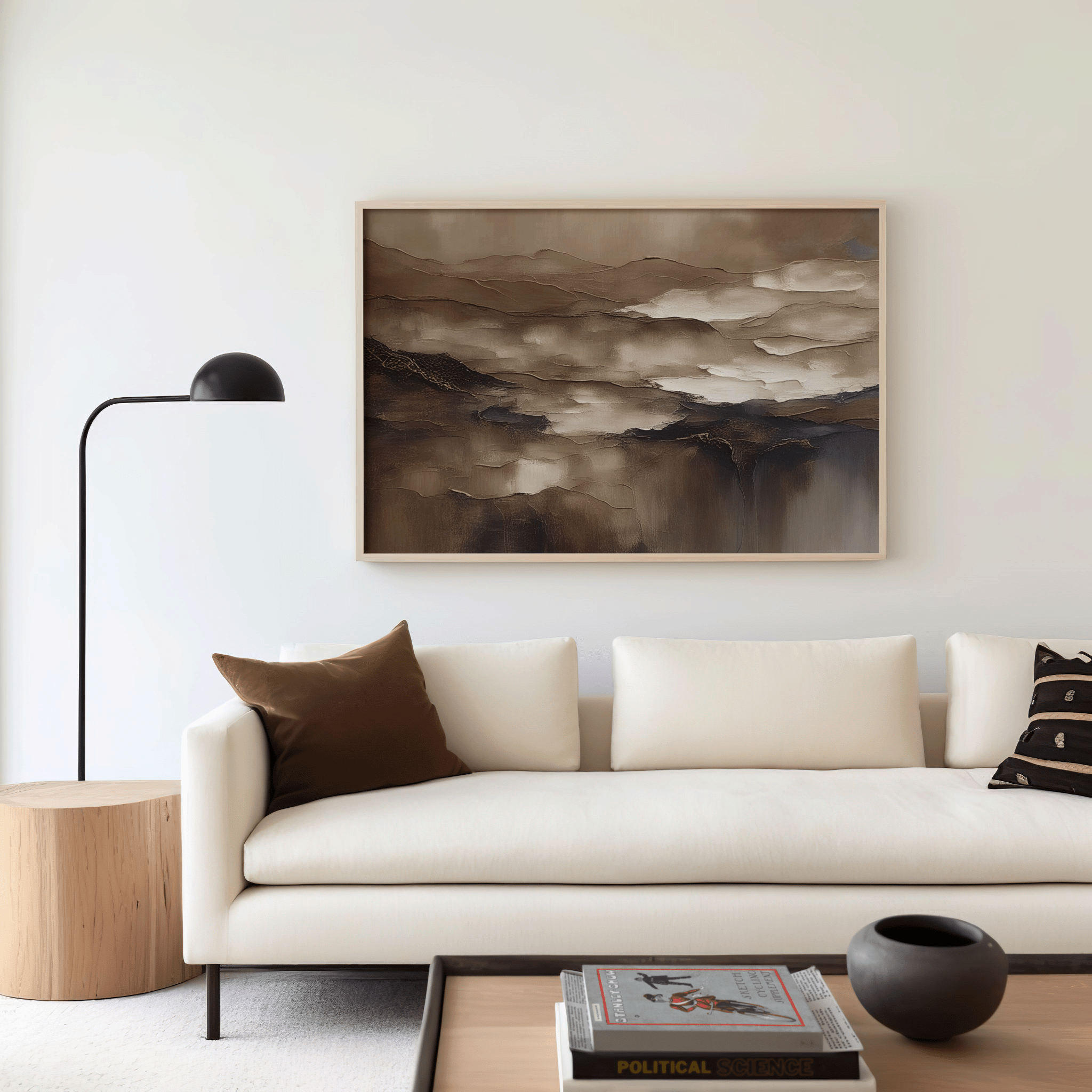 Abstract wall art sized proportionally above a beige sofa using the 2/3 rule in a modern living room
