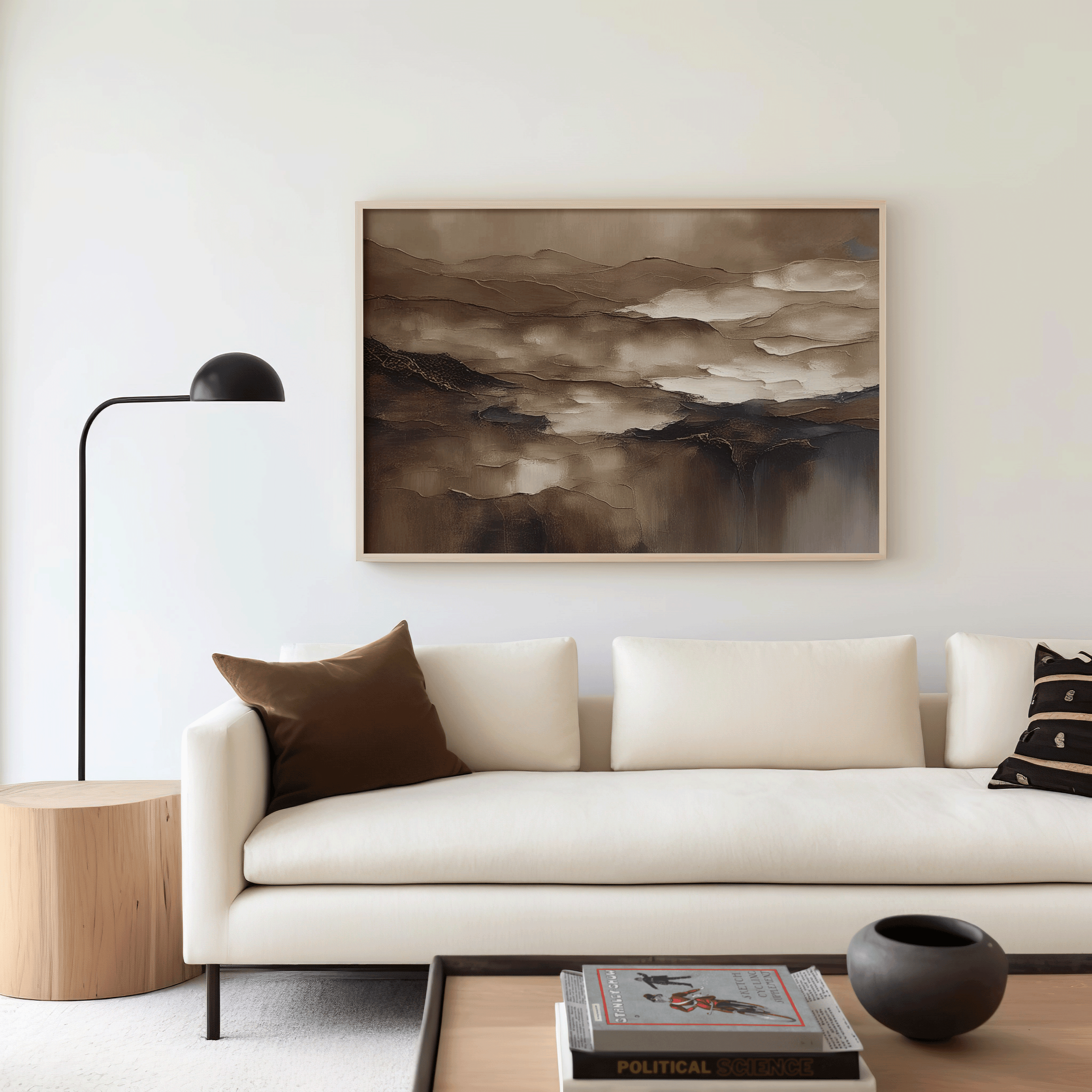 Abstract wall art sized proportionally above a beige sofa using the 2/3 rule in a modern living room