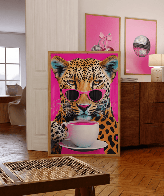 College Dorm Room Wall Art Prints - vibrant, bold leopard drinking pink coffee in a coffee cup in an open space with two other funky wall art prints