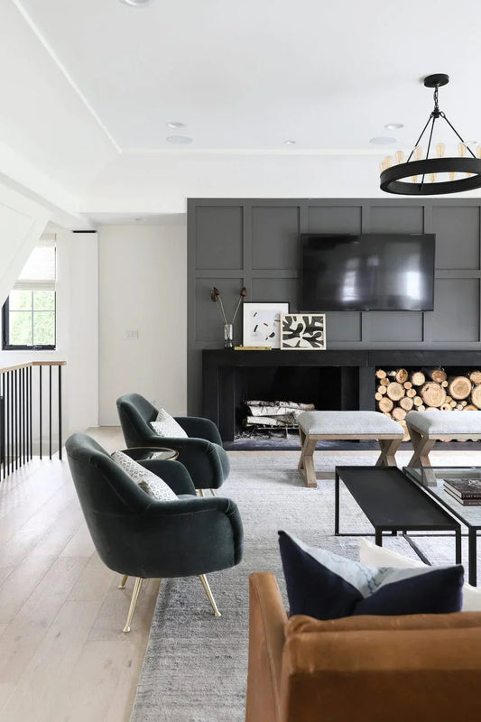 Neutral living room with wall mounted TV and minimal decor illustrating a clean TV wall design