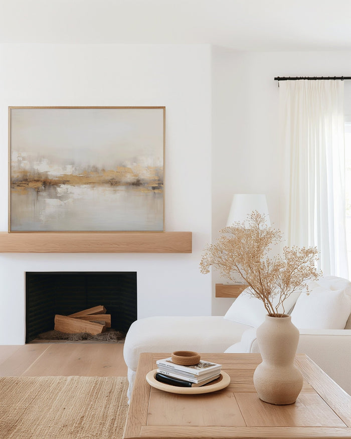 New Wall Art Arrival of a framed neutral abstract canvas print above a fireplace in a modern living room