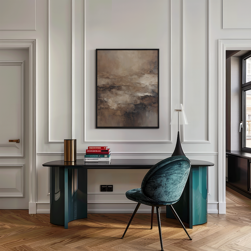 Moody abstract wall art in beige and brown tones framed above a modern desk with green velvet chair in a stylish home office