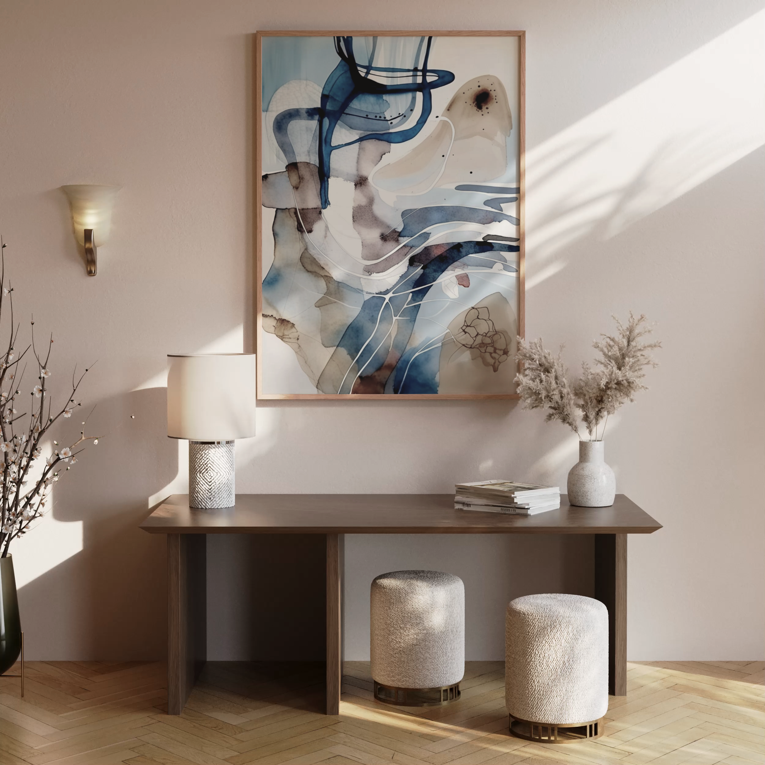 Abstract blue, white and beige watercolor wall art framed print styled above a brown wooden entryway console table with neutral décor