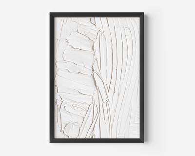 Close-up of framed abstract wall art print with faux white textured paint effect