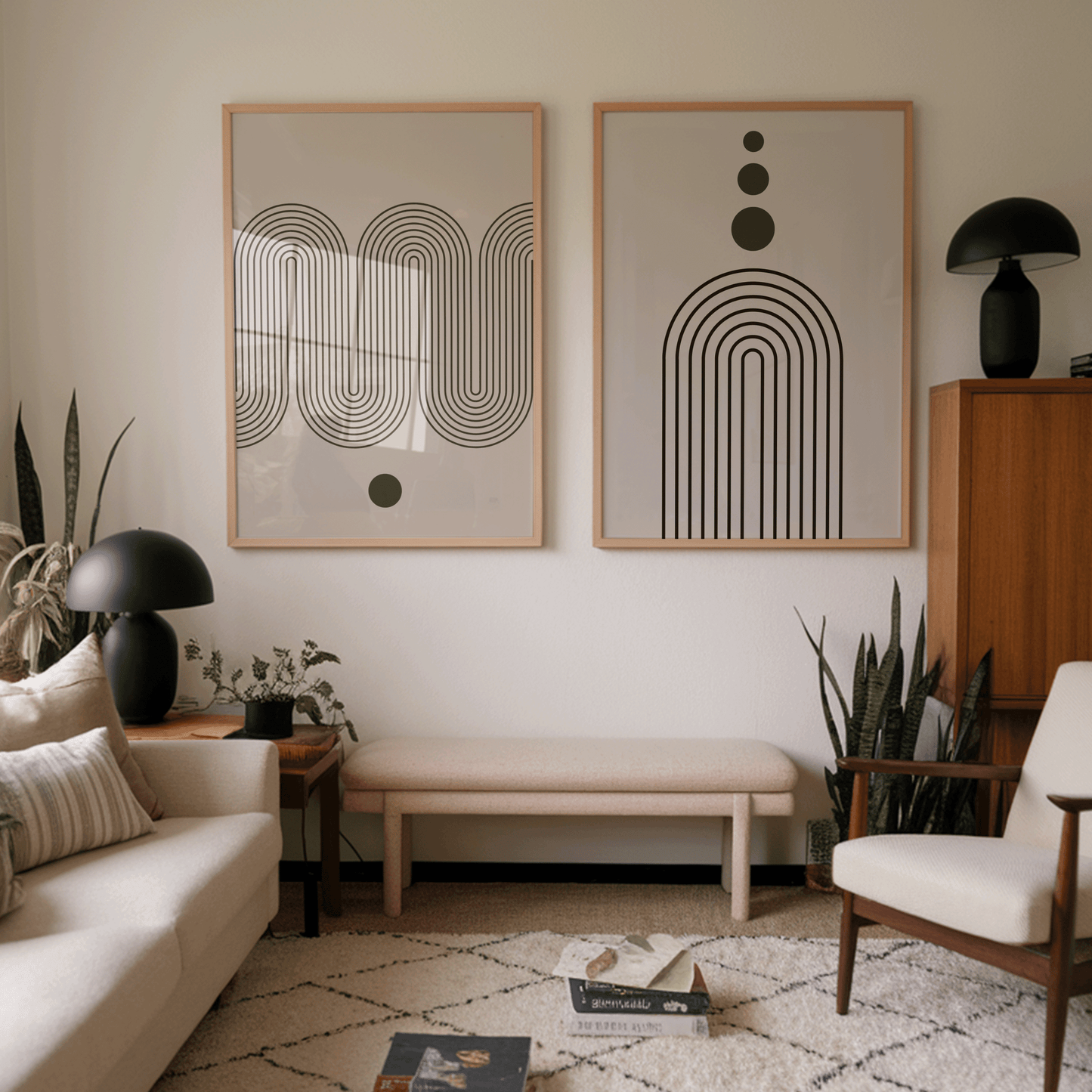 Set of arch and wave line-art prints in wood frames above a bench in a mid-century living room