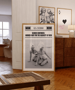 Audacity of men print in a gallery wall on a wooden sideboard beside sketch and playing card prints