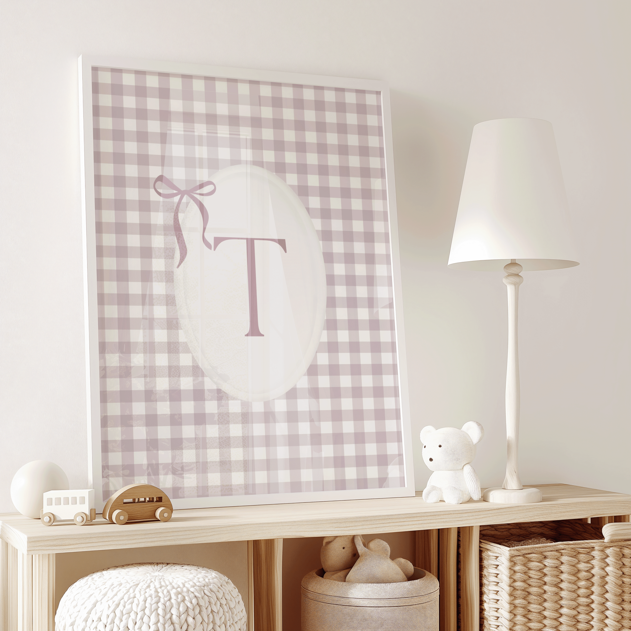 Pink gingham personalized initial wall art with letter T and blush pink ribbon bow with a white frame for modern nursery or play room styling