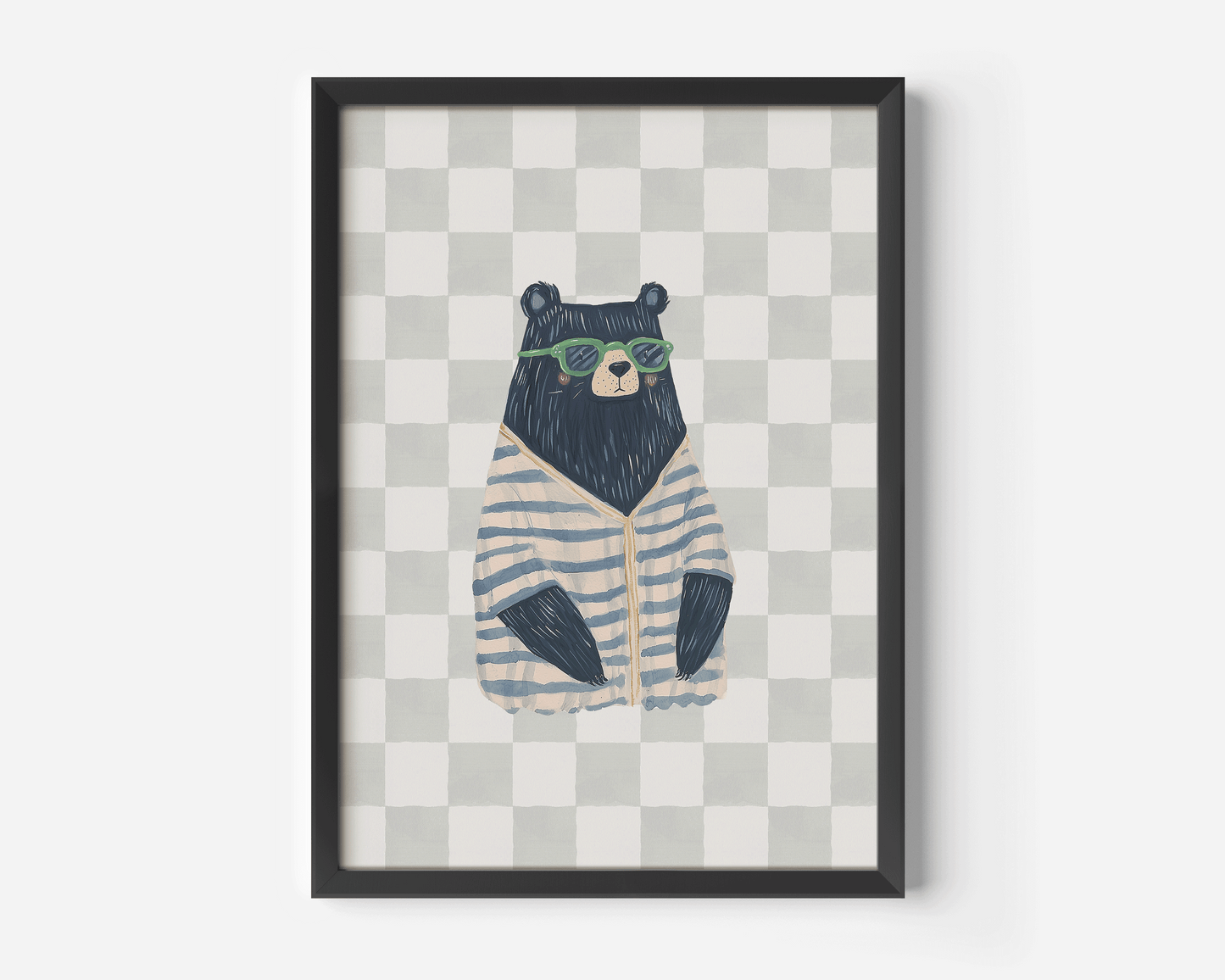 Black-framed artwork of a funky bear wearing sunglasses and a striped shirt on a checkered neutral background