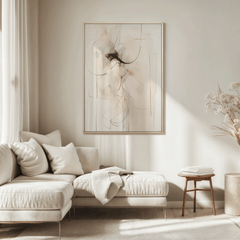 Wall art with beige and cream with black lines as a neutral abstract wall art print above beige sectional sofa in living room