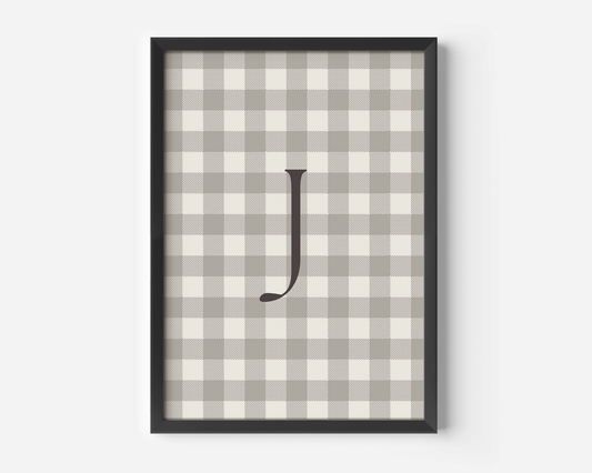 close-up of personalized beige gingham wall art with letter J, black matte frame modern nursery print for boys