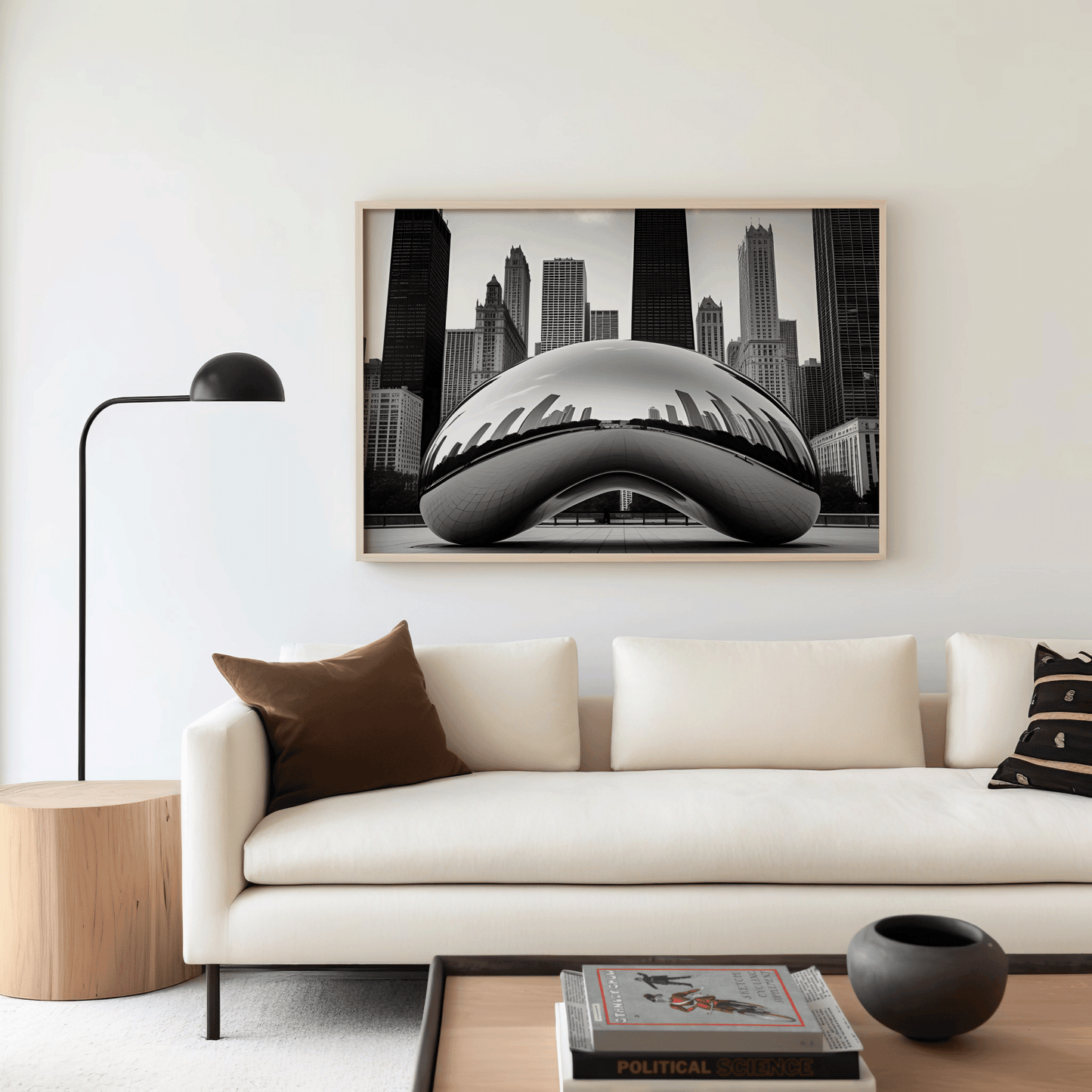 black and white  City of Chicago wall art framed above a beige sofa with a brown wooden frame in a modern, neutral living room