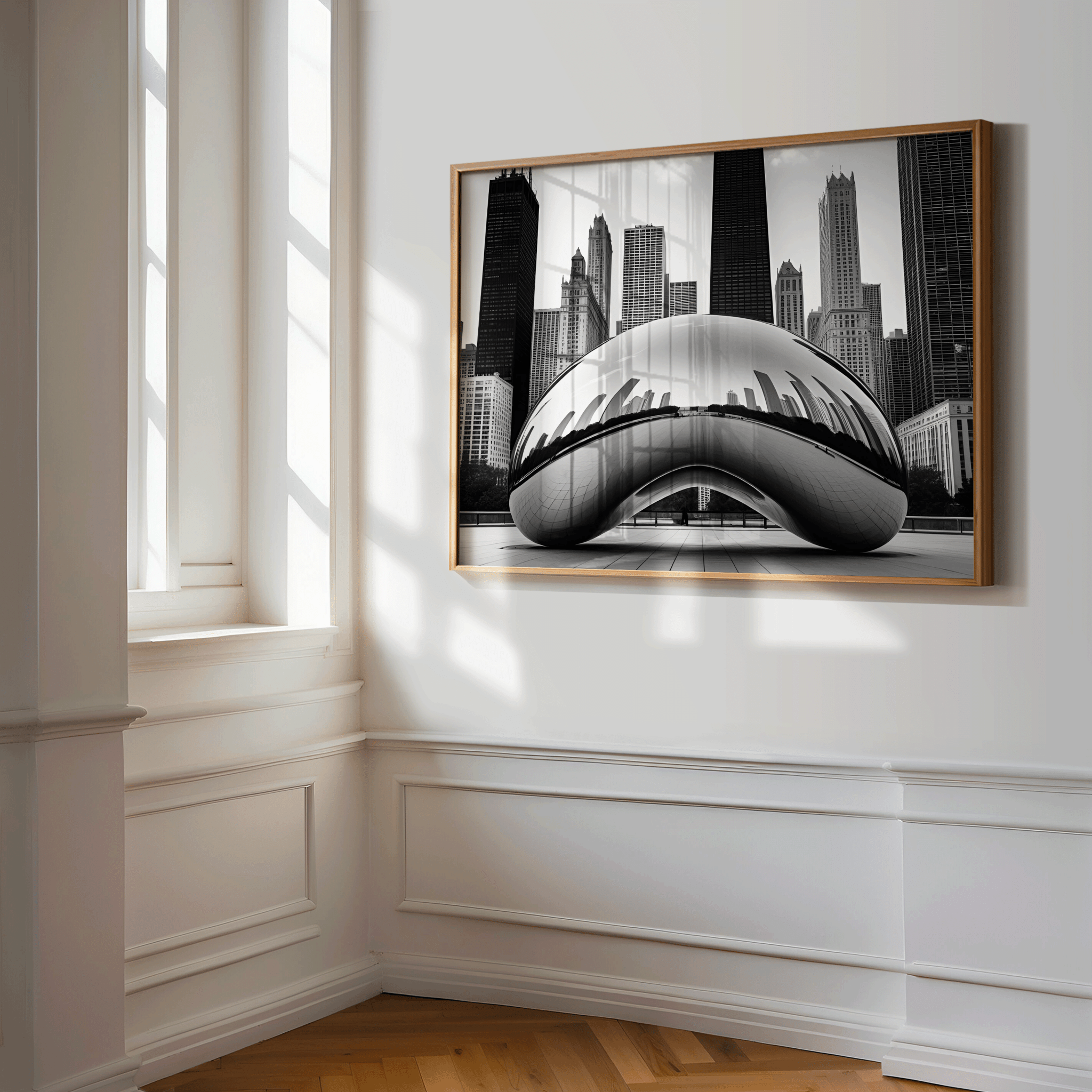 Framed artwork of a modern architectural structure of Chicago the bean on a wall with a window in the background in a hallway