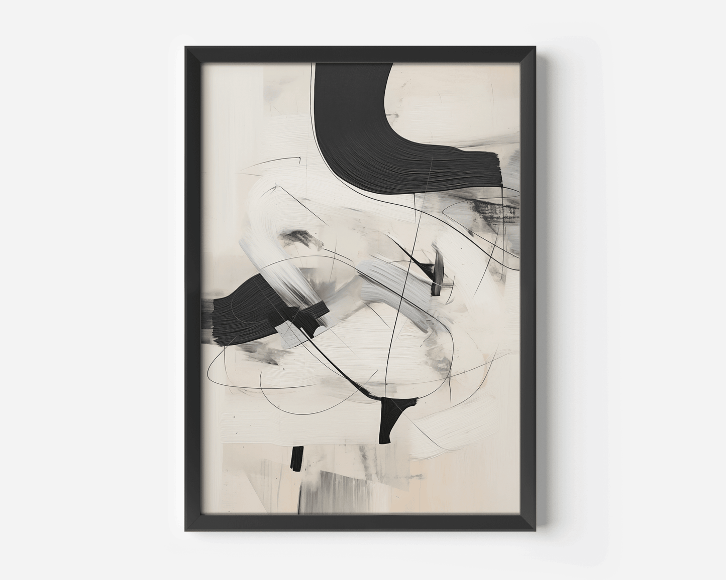 Close-up of a framed black and beige minimalist abstract art print with oil painting like brushstrokes on a neutral background.