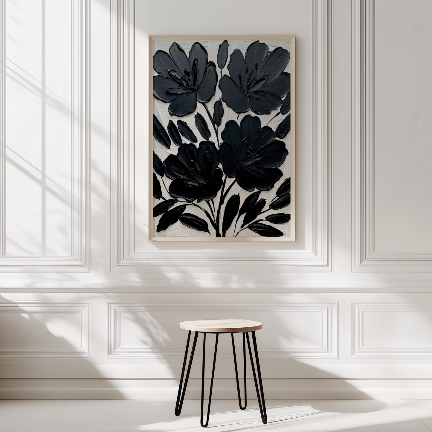 Black floral wall art abstract flower print framed and styled in a white paneled modern room with minimalist décor