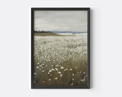 Black-framed muted vintage landscape print with delicate wildflowers and soft hills