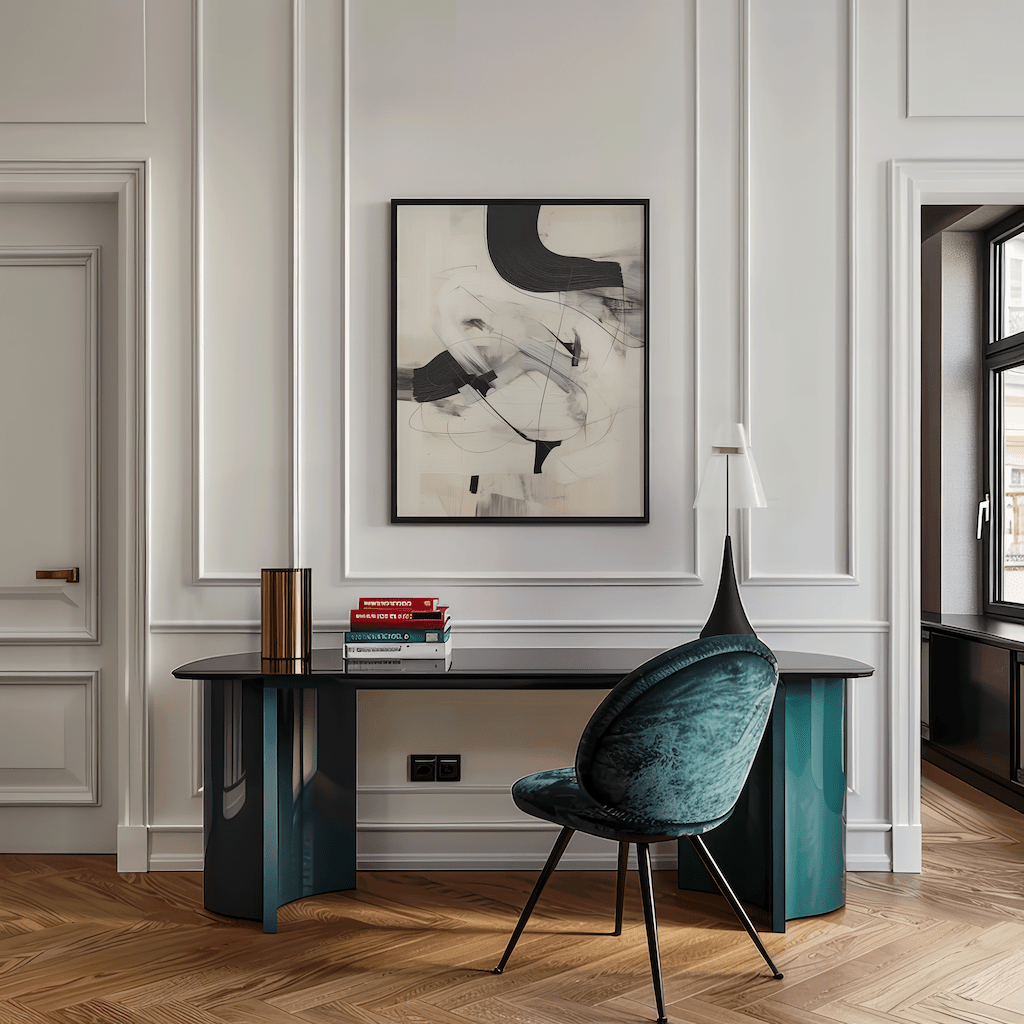 Large framed black and white abstract wall art hung above a sleek desk in a classic white home office.