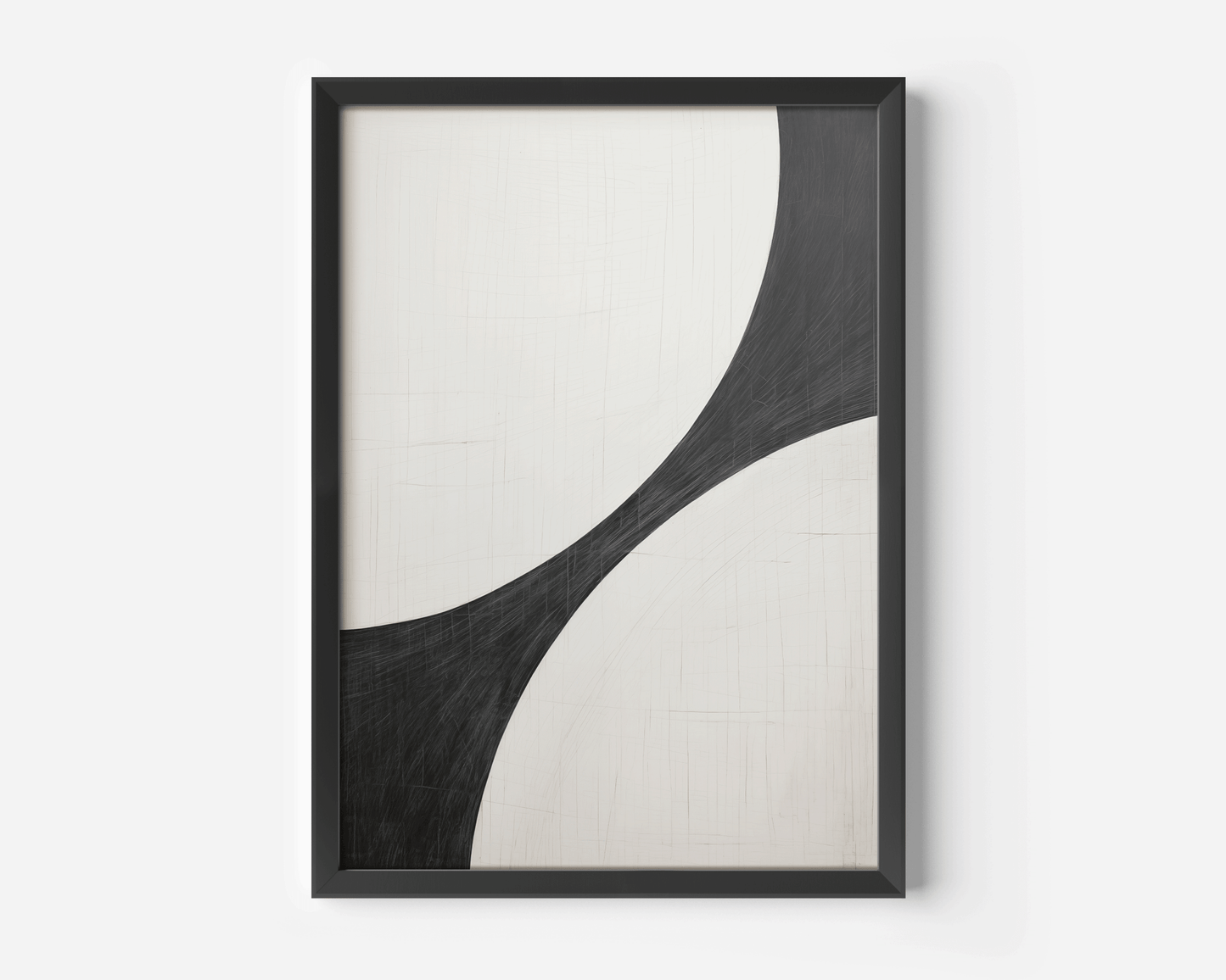 Studio close-up of the black and white curve abstract in a matte black frame on white background.