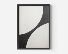 close-up of the black and white curve abstract in a matte black frame on white background.
