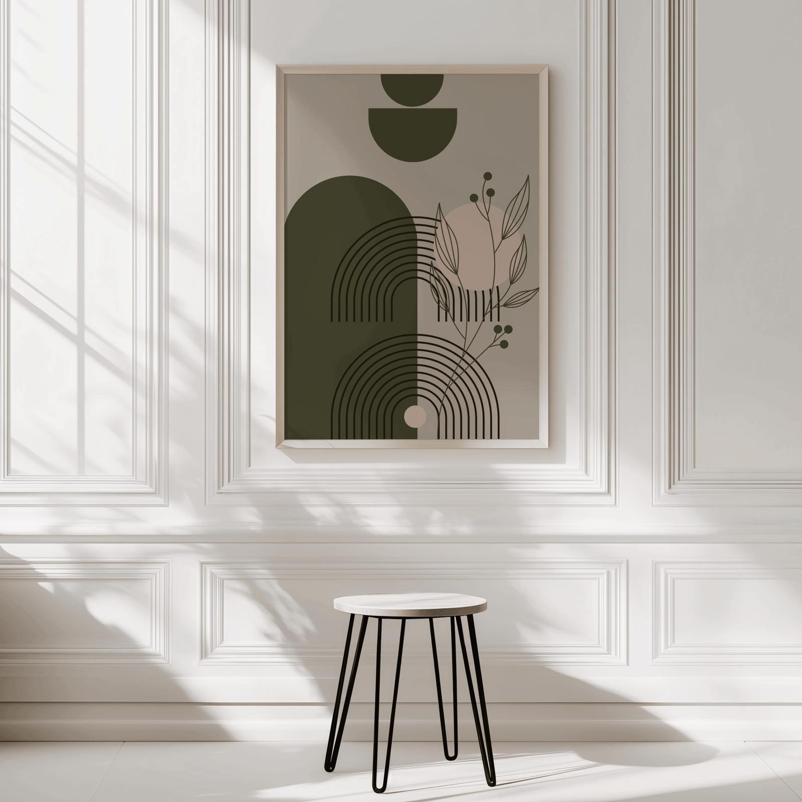 Boho botanical geometric print in a natural wood frame on a panelled entryway wall with a wooden stool