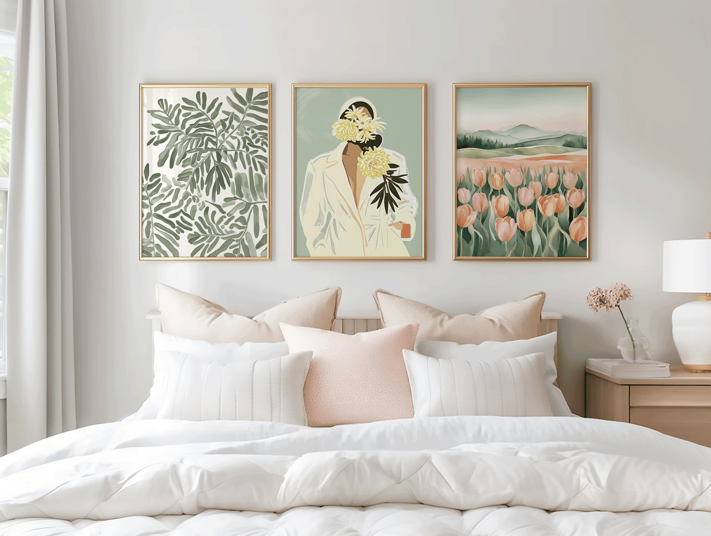 Set of three neutral wall art prints featuring a botanical leaf illustration, tulip field artwork, and soft floral garden scene, arranged above a sofa in matching light wood frames