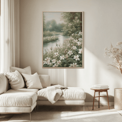 Framed botanical wall art hanging above a beige sofa in a living room