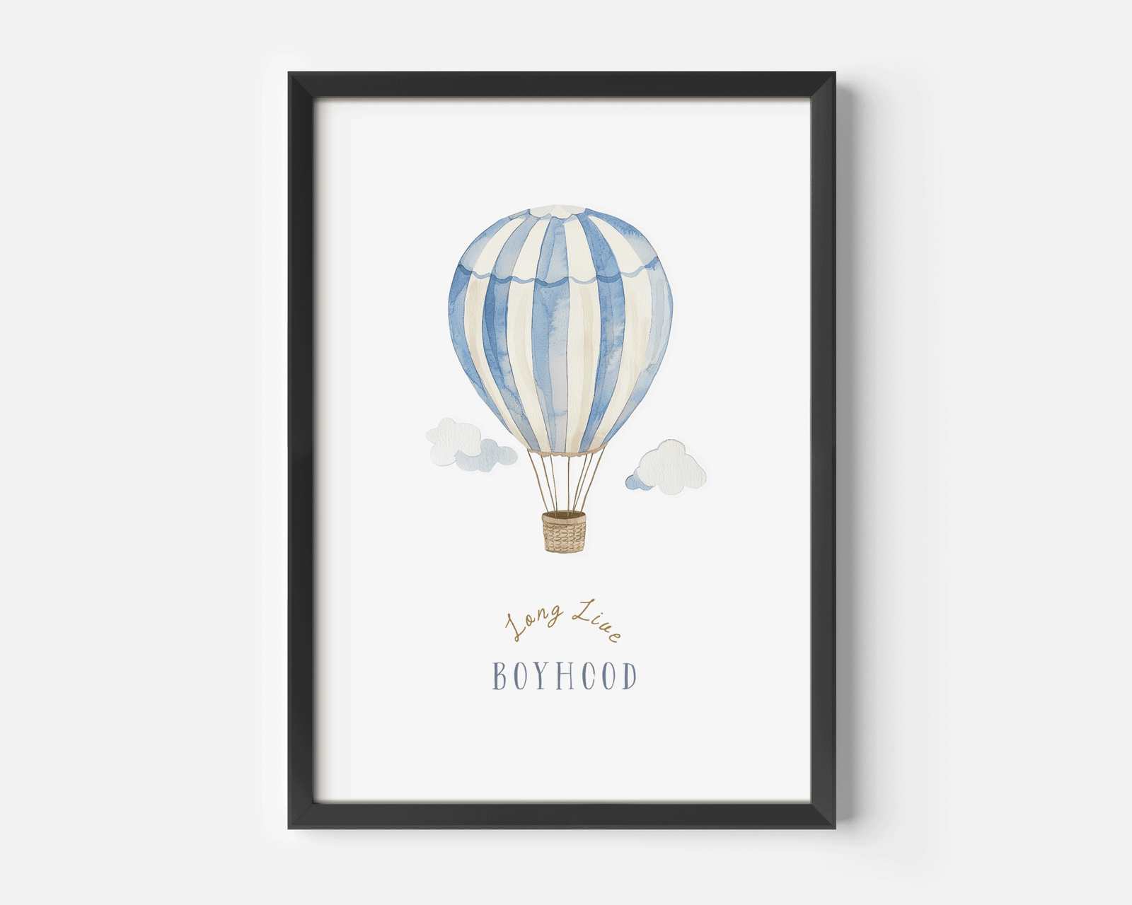 Long Live Boyhood hot air balloon nursery print in a black frame on a white wall