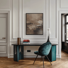 Moody abstract wall art in earthy brown tones styled in a modern office with a green velvet chair