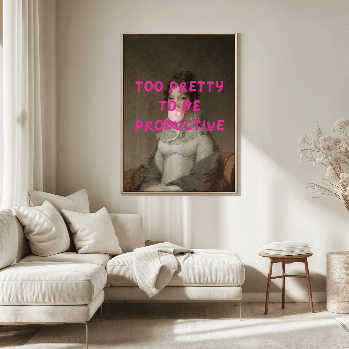 Living room with a framed vintage portrait print of a girl blowing bubble gum above a beige sofa