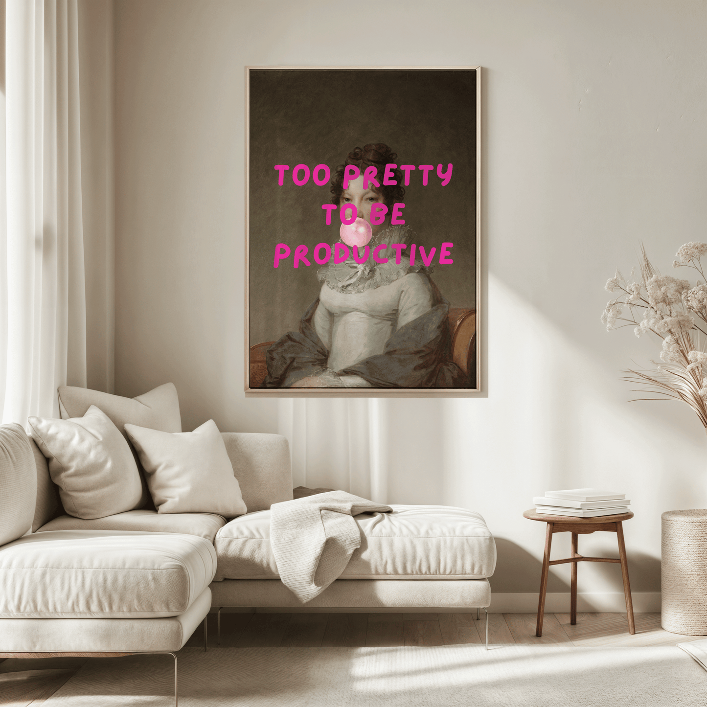 Living room with a framed bubble bum girl wall art print framed above beige sofa.