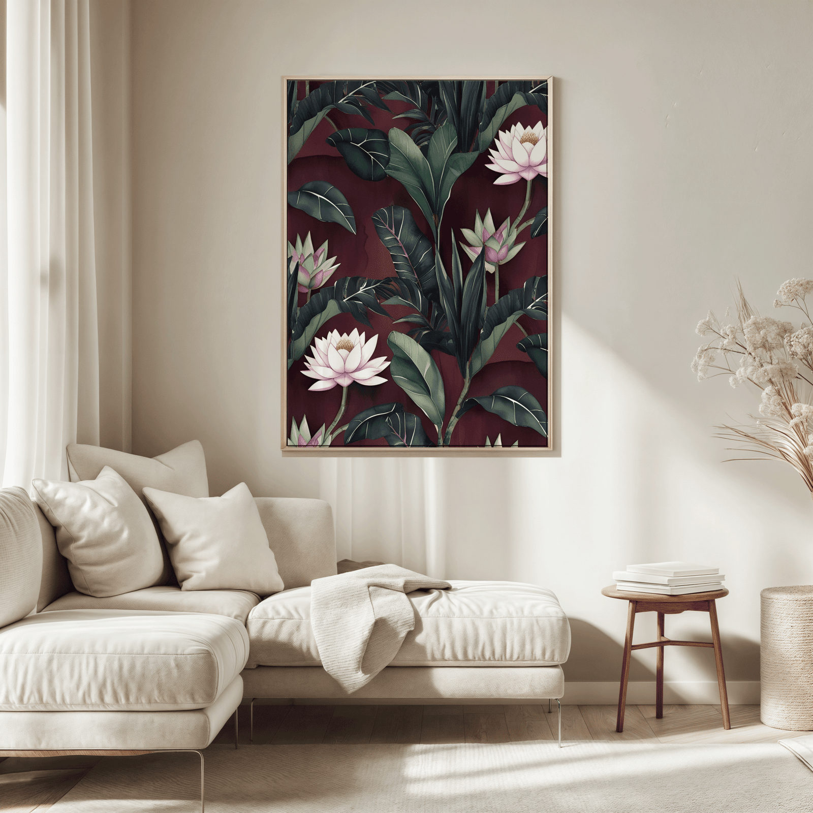 Burgundy floral canvas wall art in a natural wood frame above a cream sofa in a living room