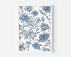 Chinoiserie wall art with blue peonies and roses in a toile pattern in a white frame