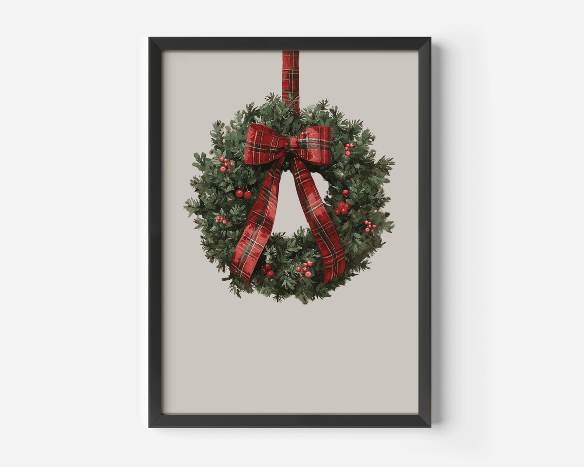 Classic Christmas wreath wall art with a red tartan bow in a black frame