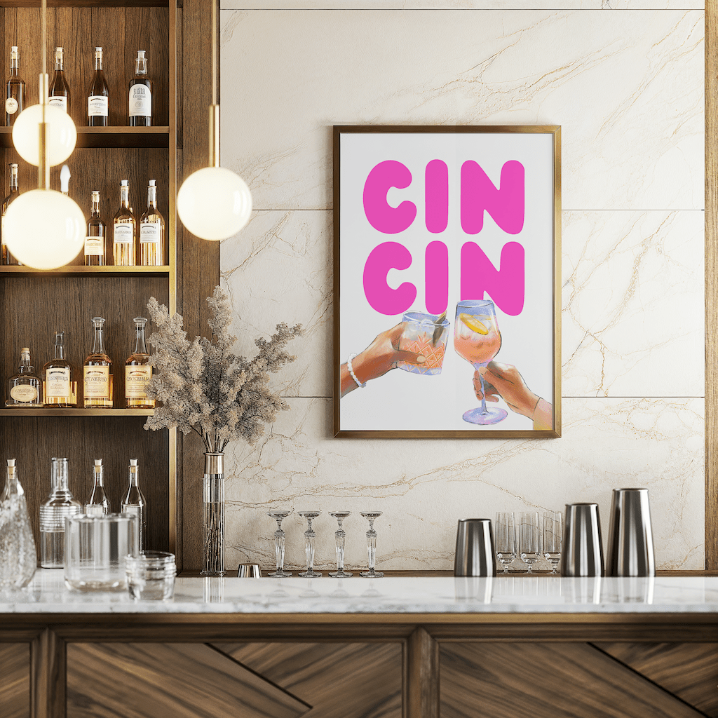 Cin cin cocktail art on a marble wall in a home bar with lit liquor shelves