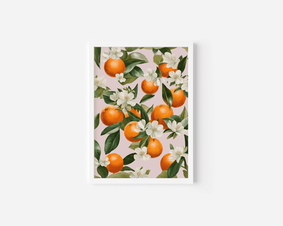 Framed citrus orange blossom wall art with white flowers and green leaves on blush pink background — perfect for kitchen or dining room décor